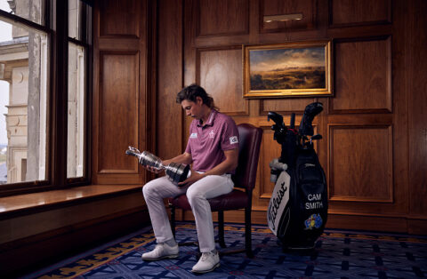 ST ANDREWS, SCOTLAND - JULY 17: (EDITORS NOTE: This image has been retouched) Cameron Smith of Australia poses with the Claret Jug in the clubhouse after winning The 150th Open at St Andrews Old Course on July 17, 2022 in St Andrews, Scotland. (Photo by Tom Shaw/R&A/R&A via Getty Images)
